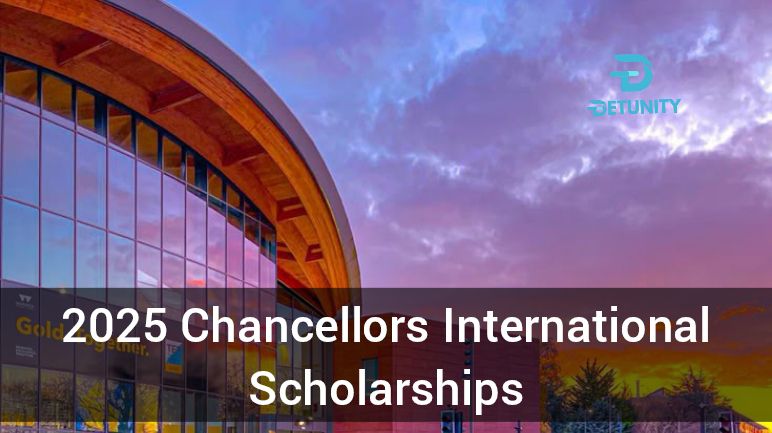 University of Warwick's 2025 Chancellors International Scholarships. It features a modern building with a curved roof and large glass windows reflecting a colorful sunset sky